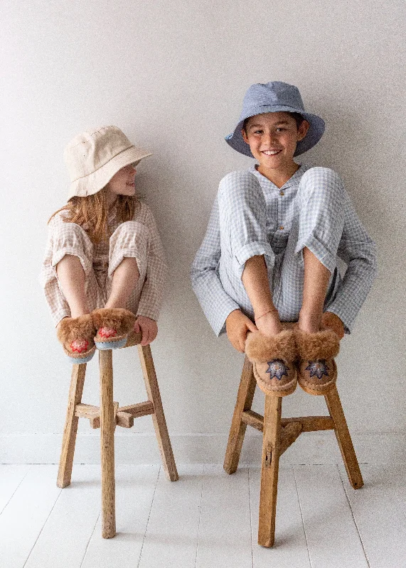 Women's Backless Slippers with a Furry Trim in Light Pink for a Cute and Casual Look Children's Sheepskin Mule Slippers – Lucky Stars – Blue Women's Backless Slippers with a Furry Trim in Light Pink for a Cute and Casual Look Children's Sheepskin Mule Slippers – Lucky Stars – Blue
